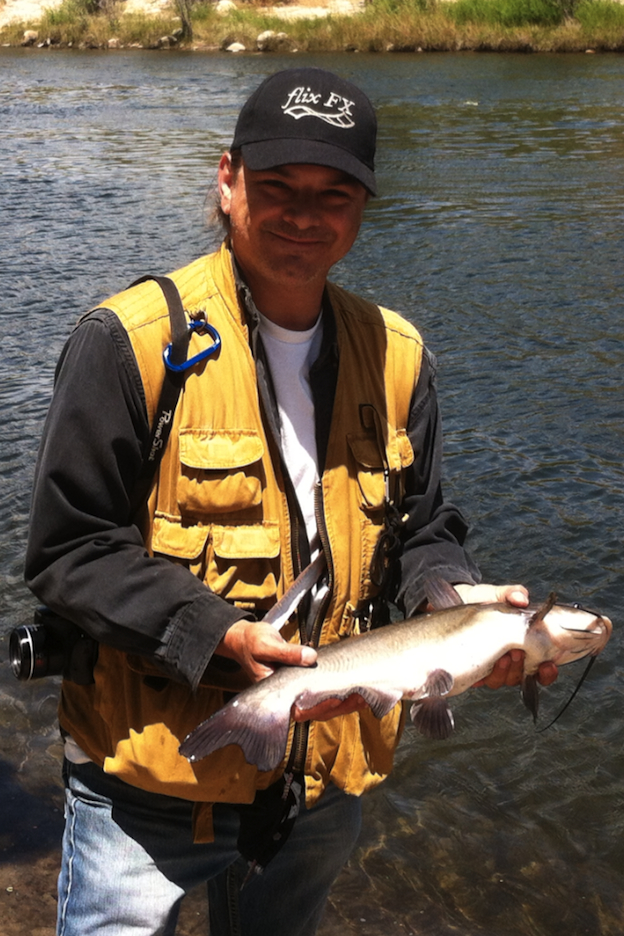 Joe Martinez with a nice catfish on the Kern River in California.