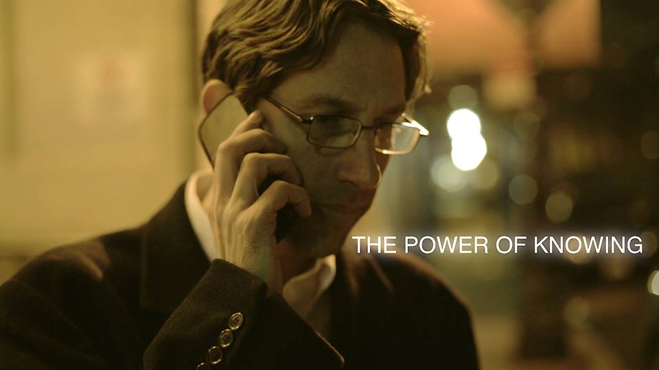 As Agent Hicks in the short film The Power Of Knowing, taking an important call.