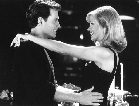 Still of Lauren Holly and Greg Kinnear in A Smile Like Yours (1997)