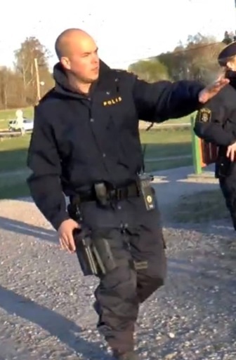 Samuel Huhmarniemi arrives at a house where the suspect is located. Location: Upplands-väsby, Sweden with Film Police