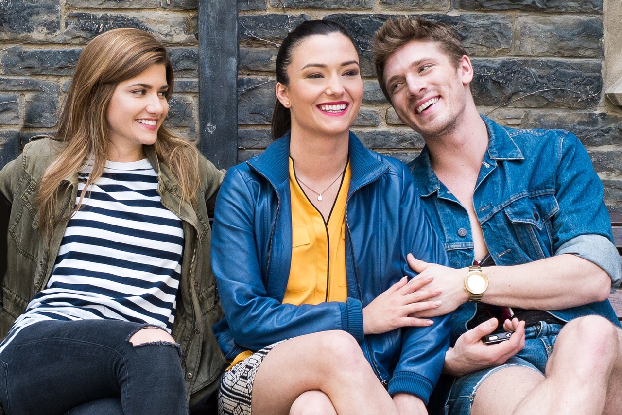 Elise Bauman, Natasha Negovanlis, and Justin Gerhard in a promotional photo for the Almost Adults film.