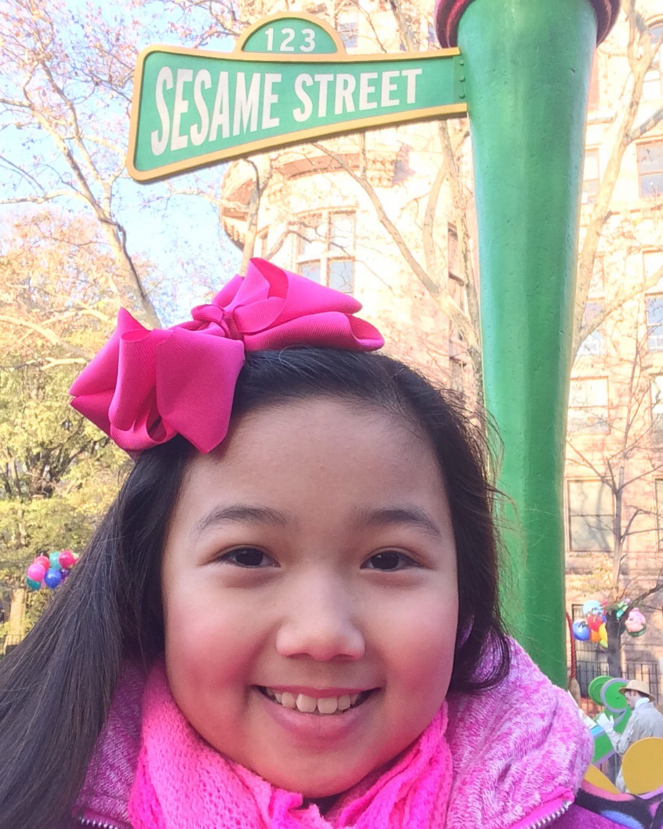 RAINA CHENG on the Sesame Street Float at the 89th Macy's Thanksgiving Day Parade, 11/26/2015