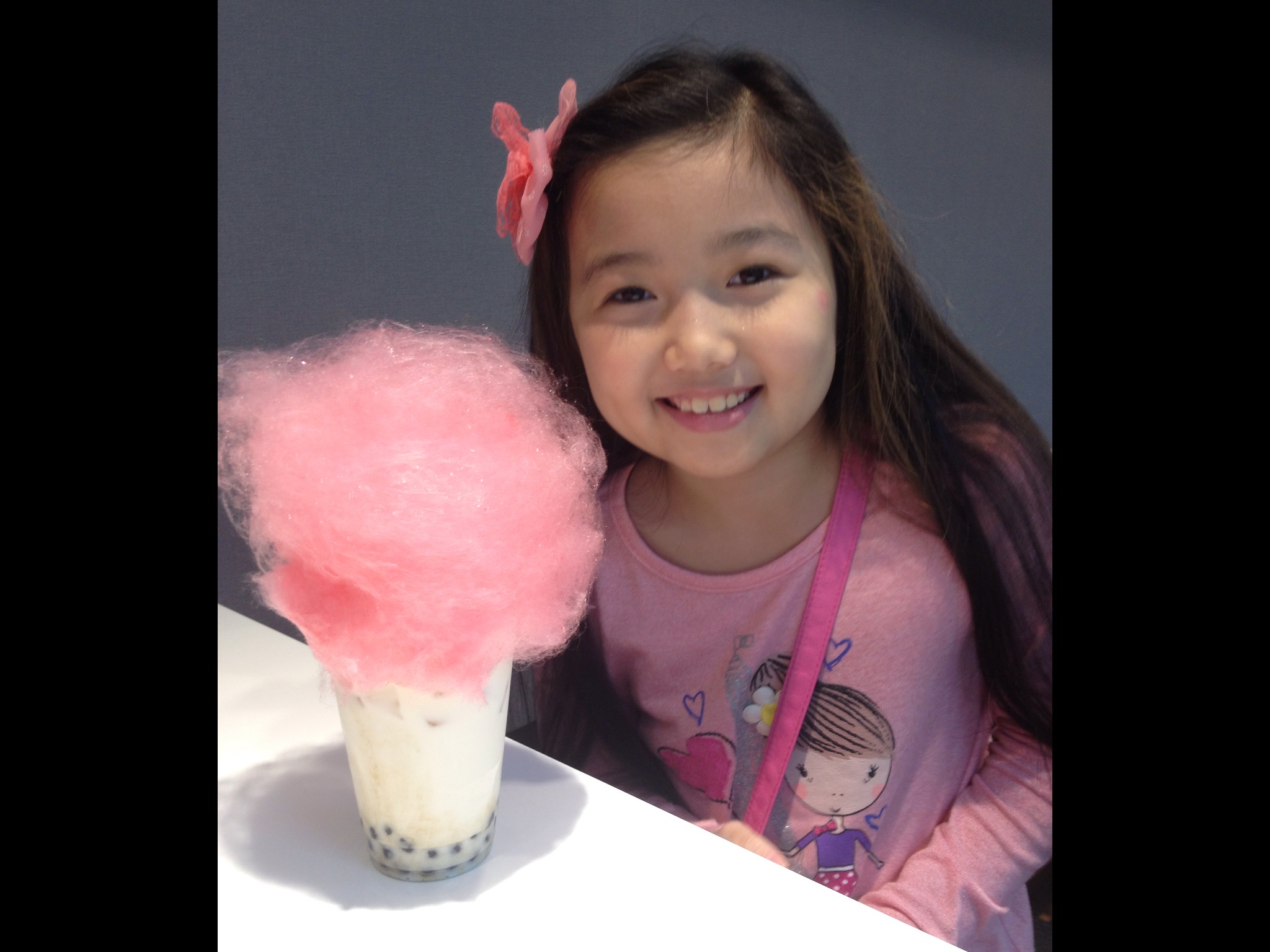 Raina Cheng about to enjoy this pretty bubble tea with cotton candy! 11/2015