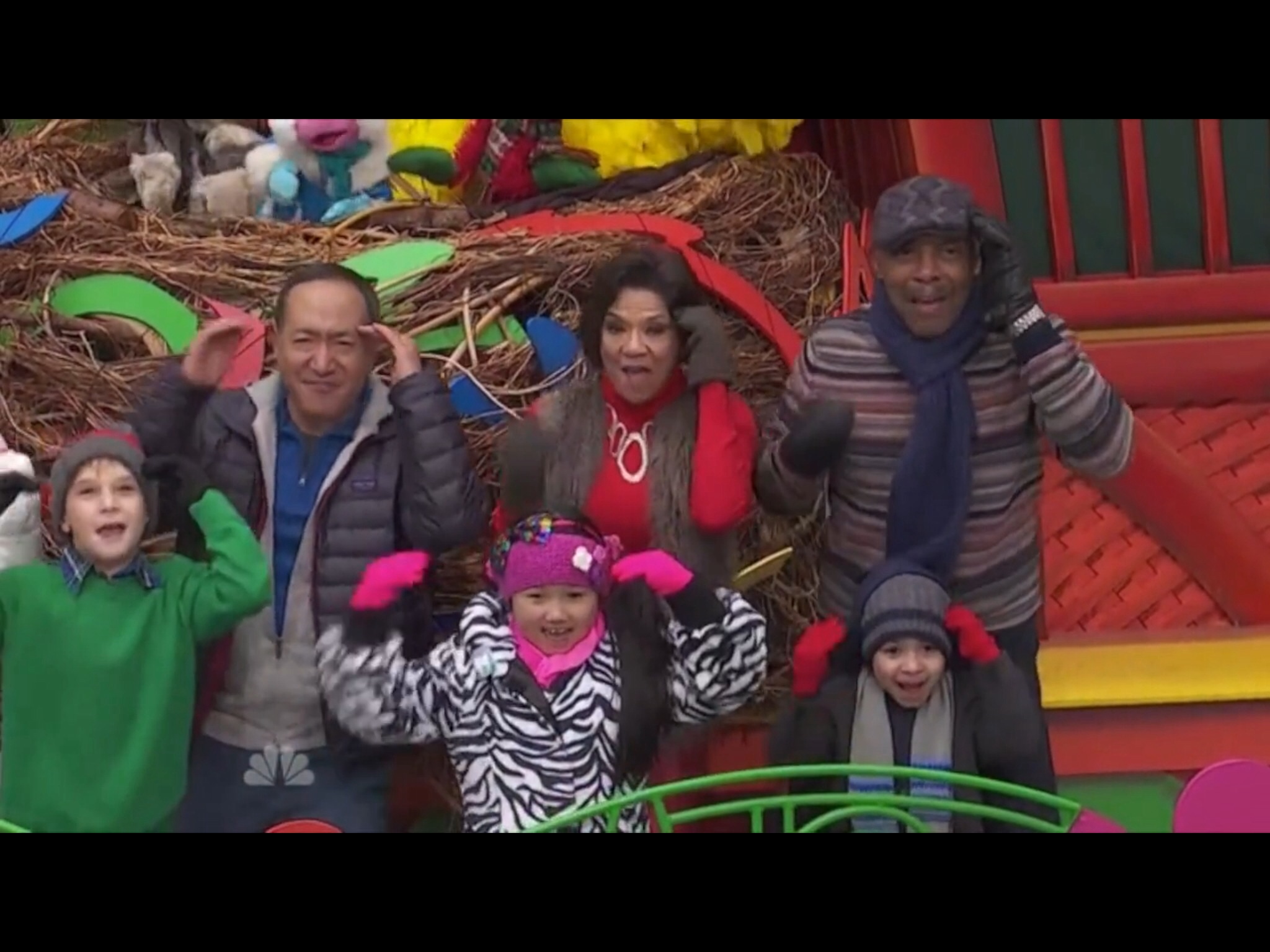 Raina Cheng & cast of Sesame Street performing on the Sesame Street float at the 88th Macy's Thanksgiving Day Parade. 2014