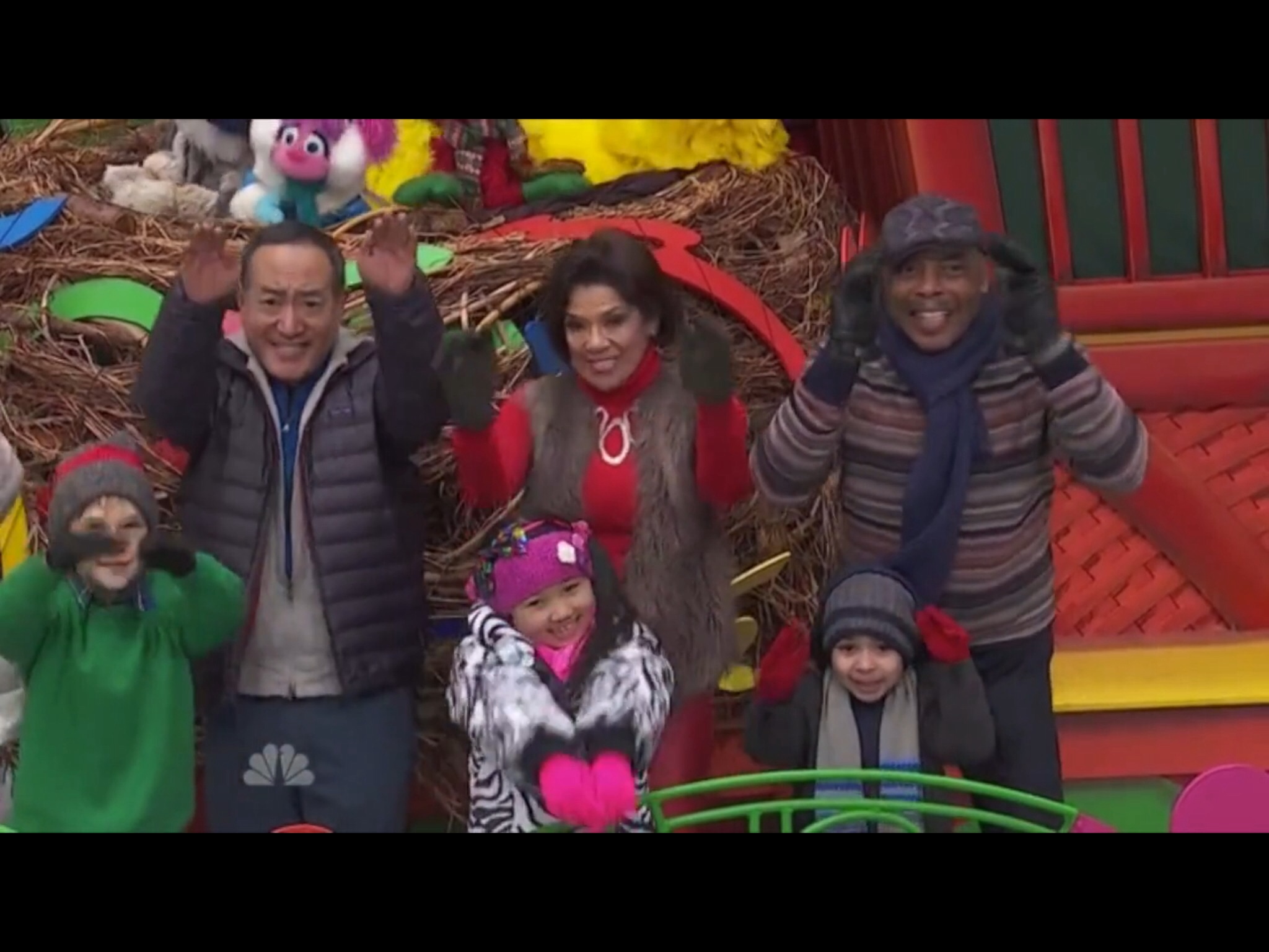 Raina Cheng & cast of a Sesame Street performing on the Sesame Street float at the 88th Macy's Thanksgiving Day Parade. 2014