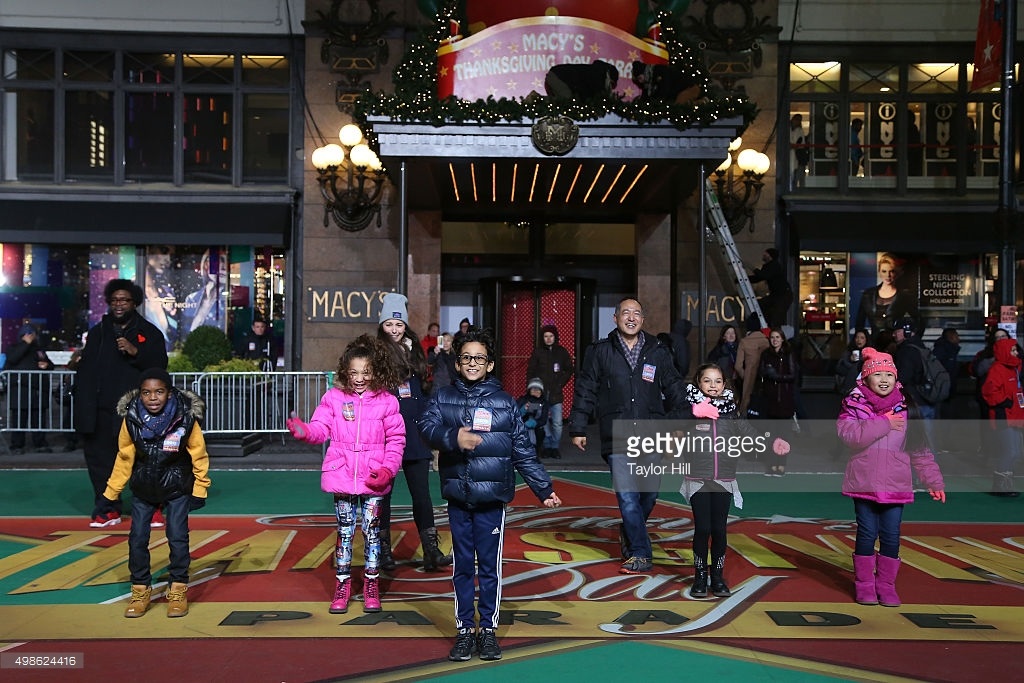 RAINA CHENG (Far right) at 89th Macy's Thanksgiving Day Parade Rehearsal with Sesame Street cast members Alan Muraoka & Suki Lopez; Questlove & fellow child performers, 11/2015. She performed on the Sesame Street Float in the previous year as well.