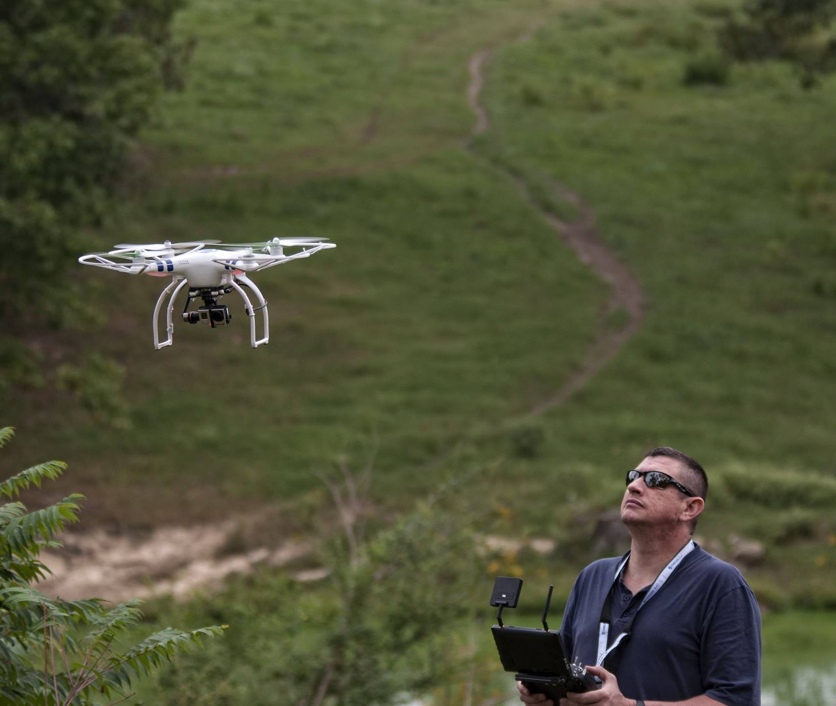 Operating a Phantom 2 drone.