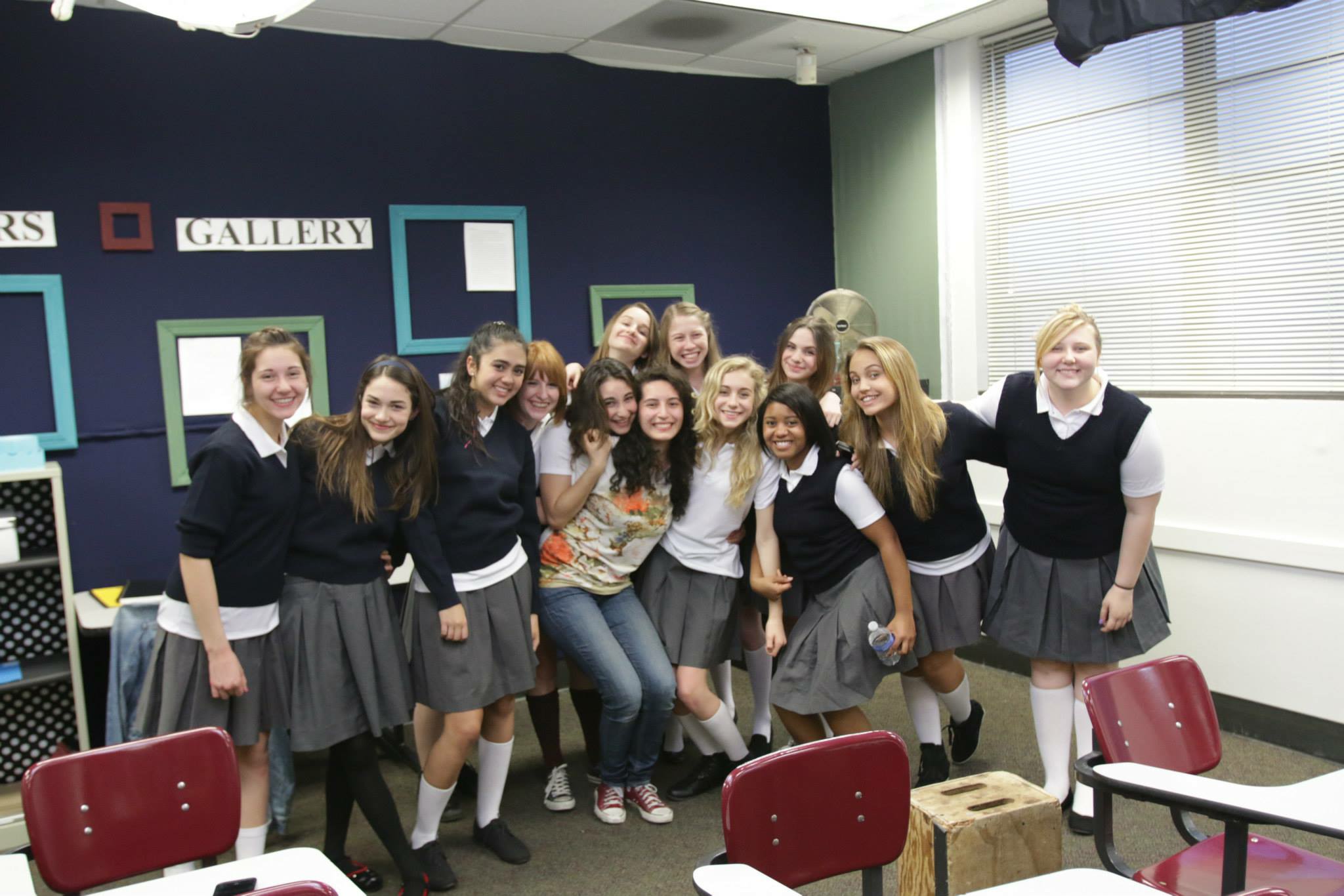 Elise Metcalf with the cast and director of The Classroom