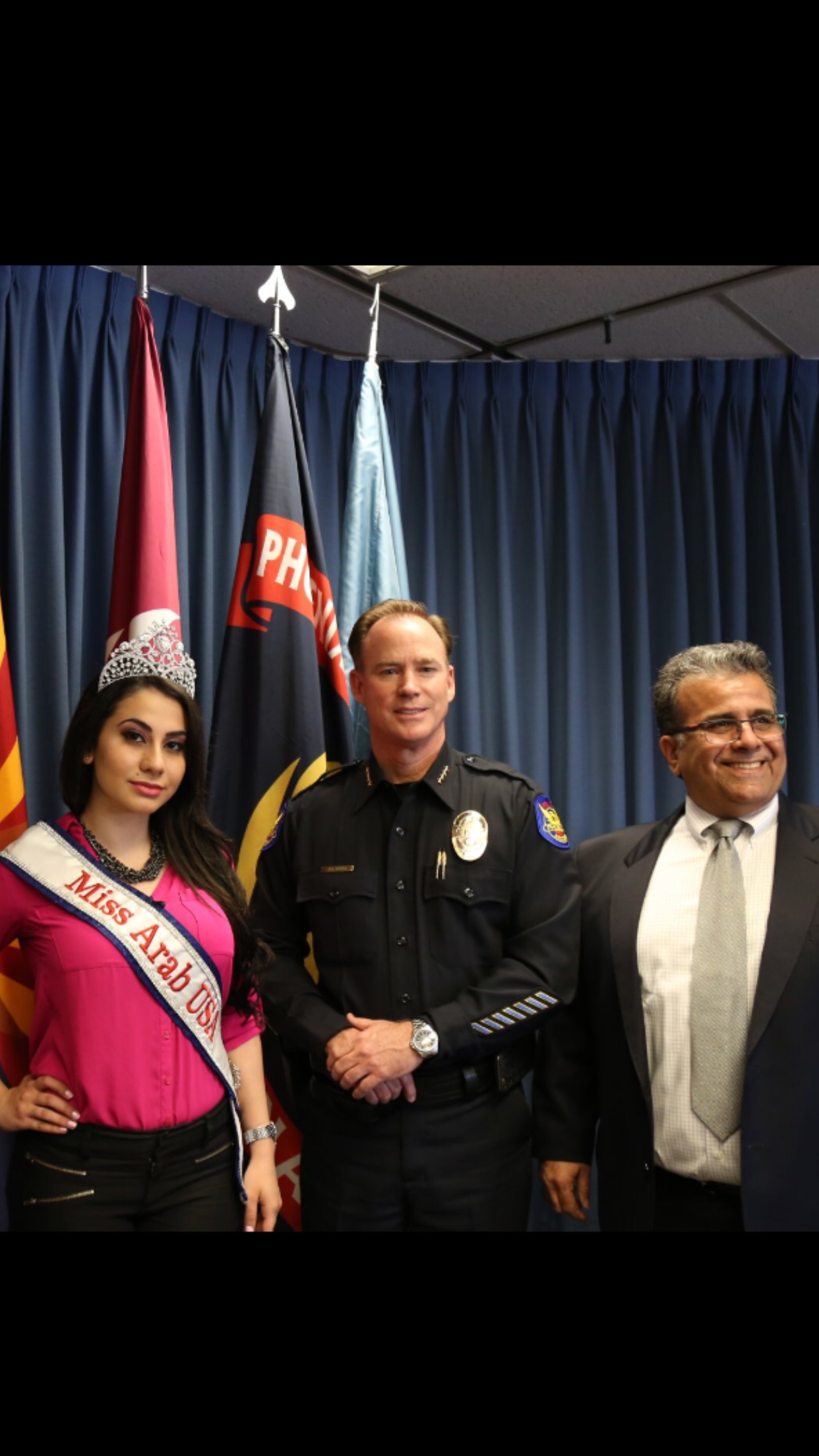Director George Nemeh with 2014 Beauty Pageant winner and the honor of Phoenix PD commissioner