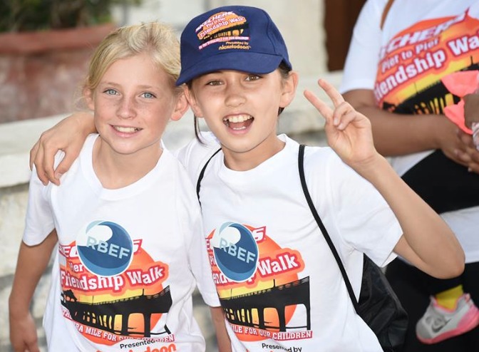 Theresa Laib & BFF Eden at Skechers 2014 Pier-to-Pier Friendship Walk to raise funds for Special Needs Kids. At https://www.facebook.com/SKECHERSFriendshipWalk