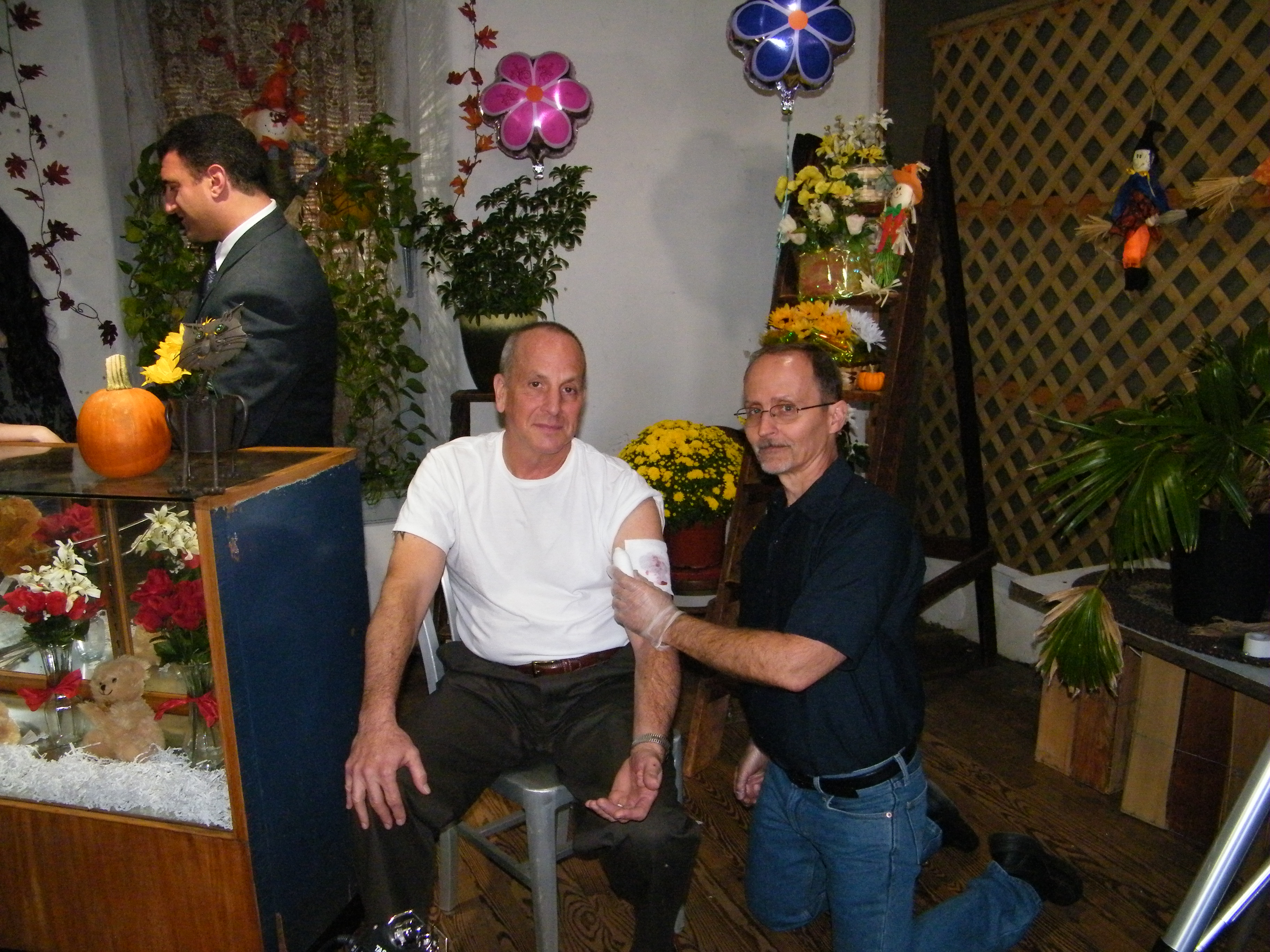 As a paramedic (with actor Stan Jacobs), on the set of the Potent Media horror short, DEATH FOLLOWS (written and directed by Carmela Hayslett).