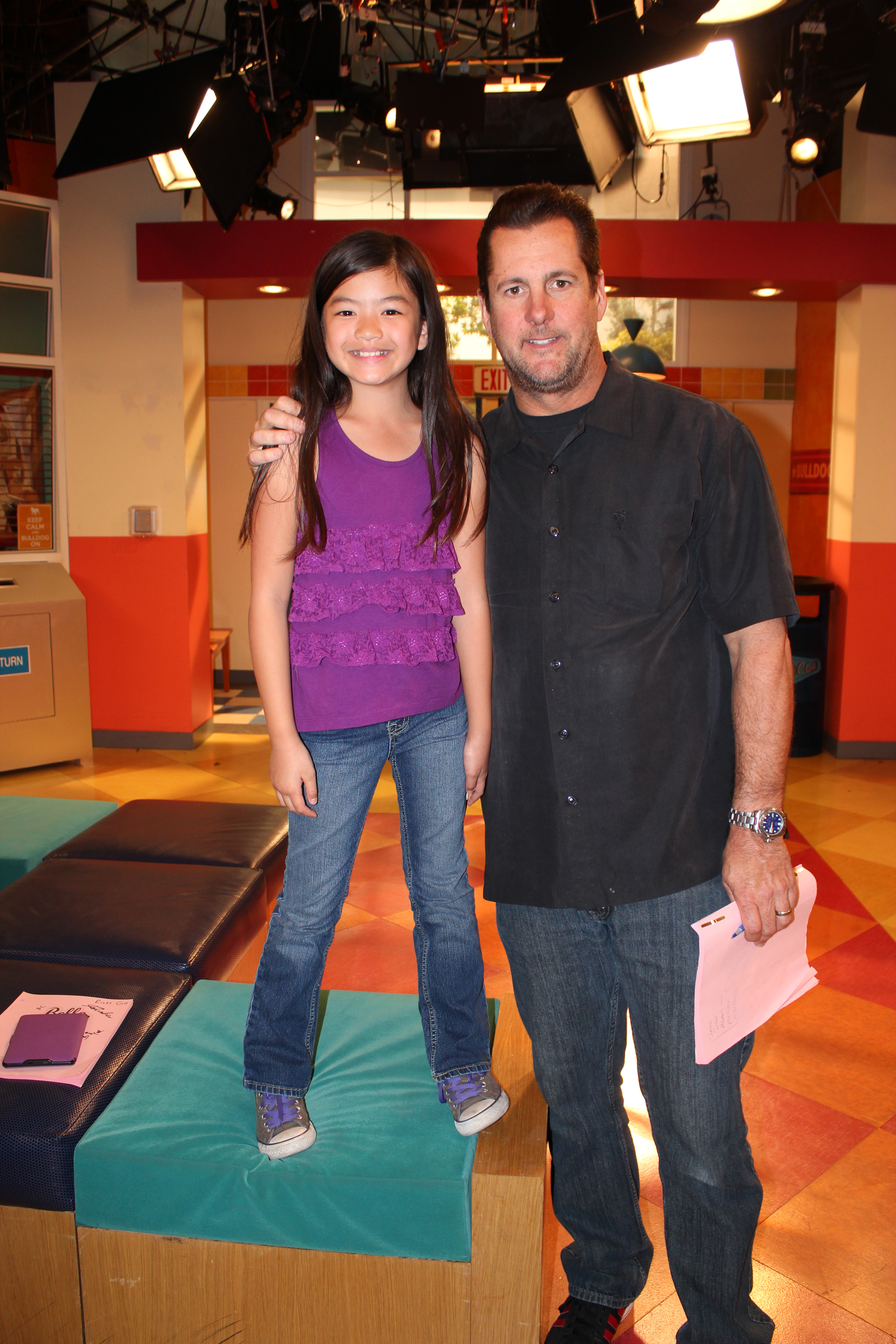 Riley Go and Director Sean Lambert, on the set of Nickelodeon's Bella and the Bulldogs.