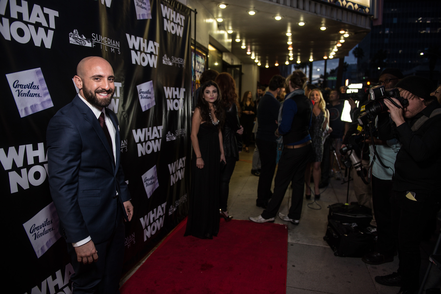 Joseph Cassiere walking the red carpet for the premiere of 