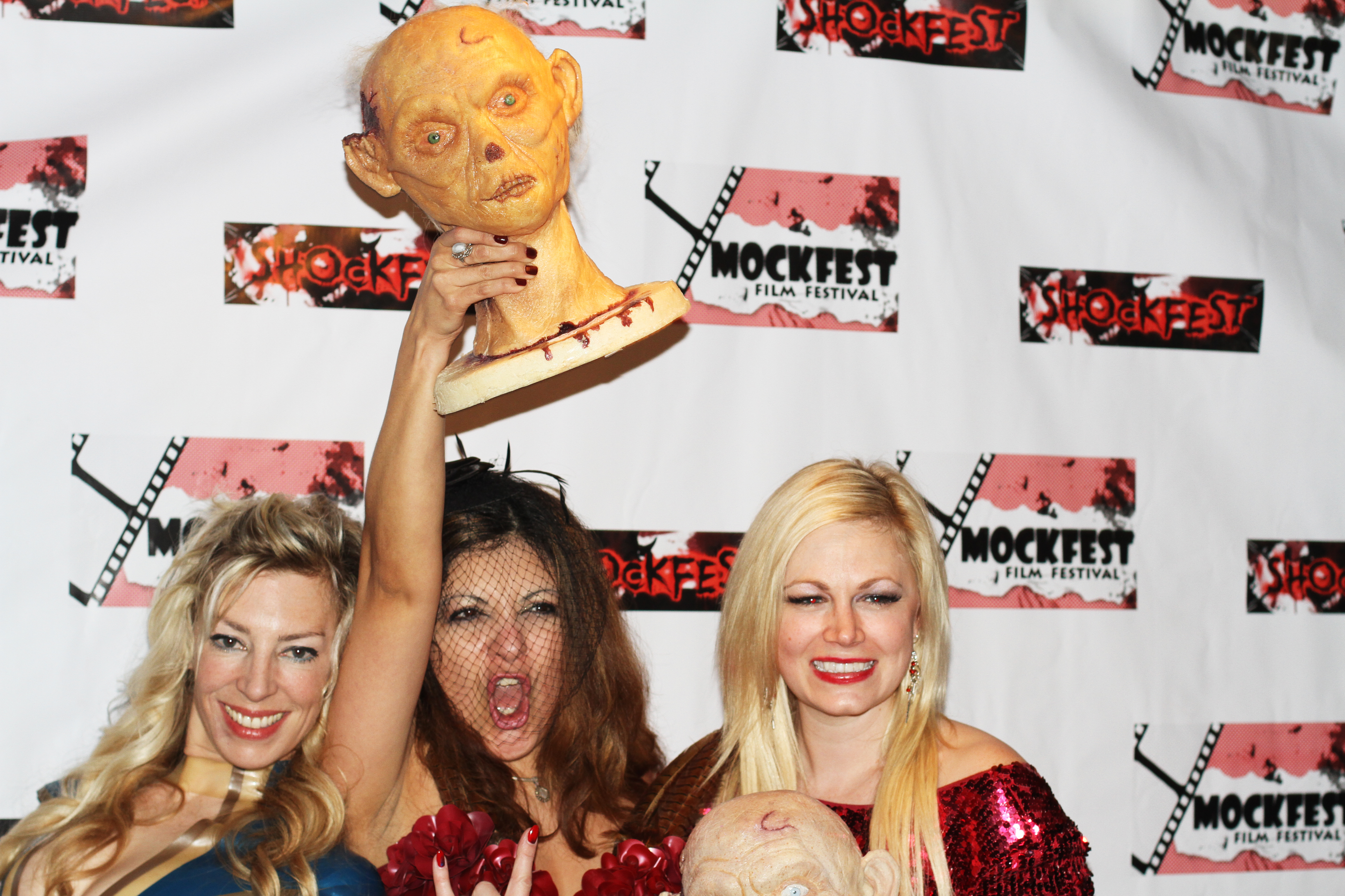 With actresses Jenimay Walker (Ceramic Tango, Serpent's Lullaby) and actress/director Jessica Cameron (Truth or Dare). On the red carpet at the Shockfest Film Festival, holding our awards. Raleigh Studios, in Hollywood, CA (USA).