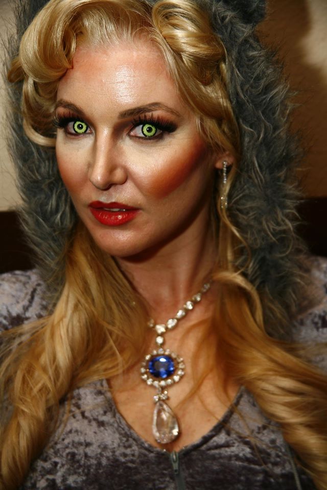 Halloween Hostess costume as a bejeweled werewolf wearing the Hope Diamond