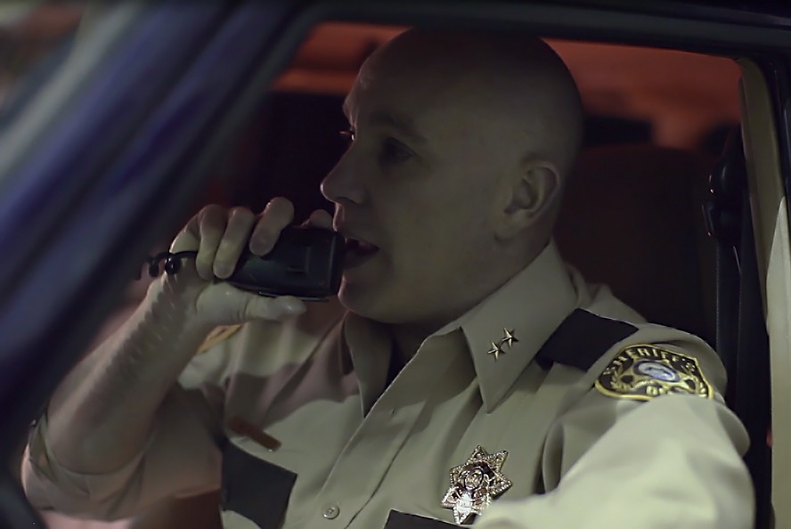 Mark Dossett as Sheriff Parks in THE TORMENT OF LAURIE ANN CULLOM