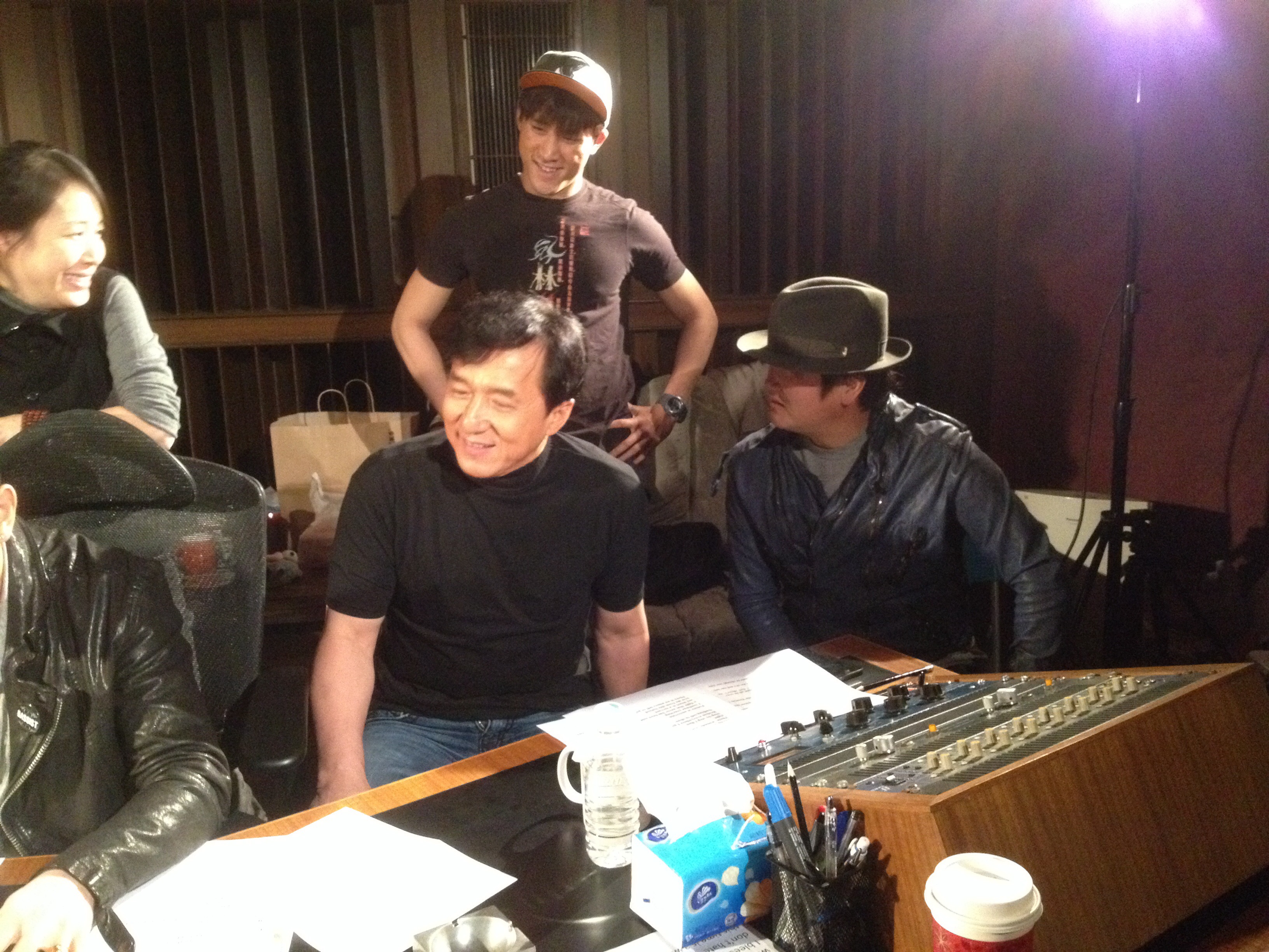 Jerry Liau working with Jackie Chan in the recording studio