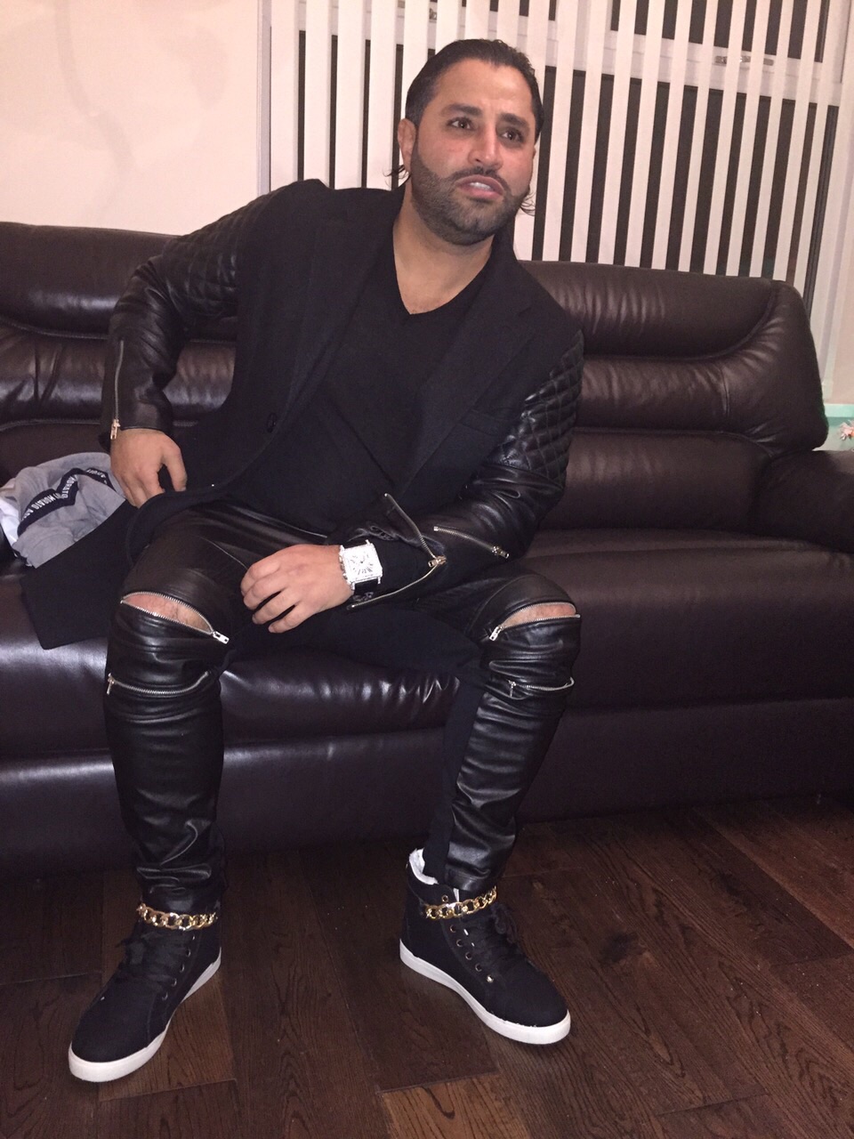 Watching the Boxing wearing jacket from lescott & Stuart biker jeans from Zara black v-neck jumper from Zara and high top boots from Giuseppe Zonnetti Watch by Frank Muller (2014)