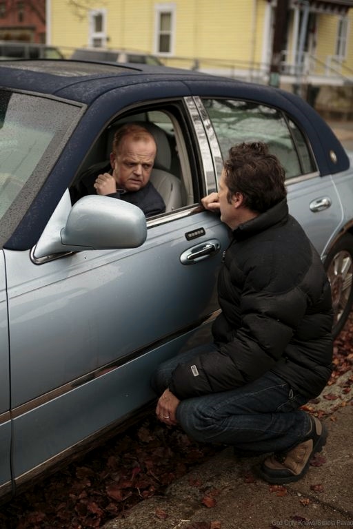Actor Toby Jones with director James Mottern on set of crime film BY THE GUN
