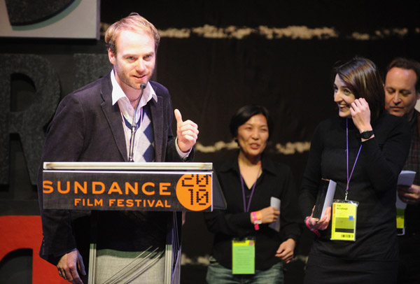 Director of Photography Michael Lavelle accepts the World Cinema Cinematography Award for Documentary for 