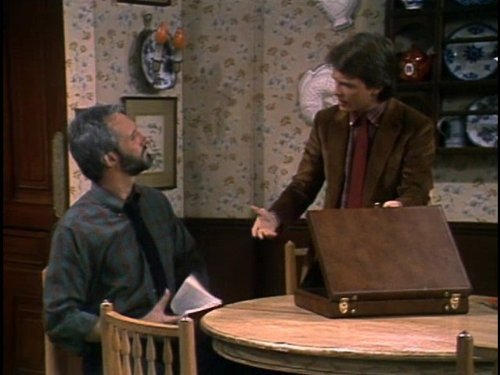 Still of Michael J. Fox and Michael Gross in Family Ties (1982)