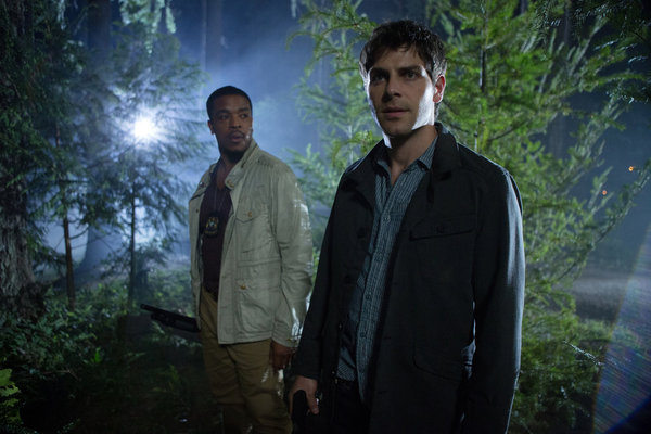 Still of Russell Hornsby and David Giuntoli in Grimm (2011)