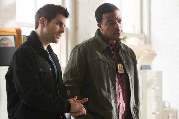 Still of Russell Hornsby and David Giuntoli in Grimm (2011)