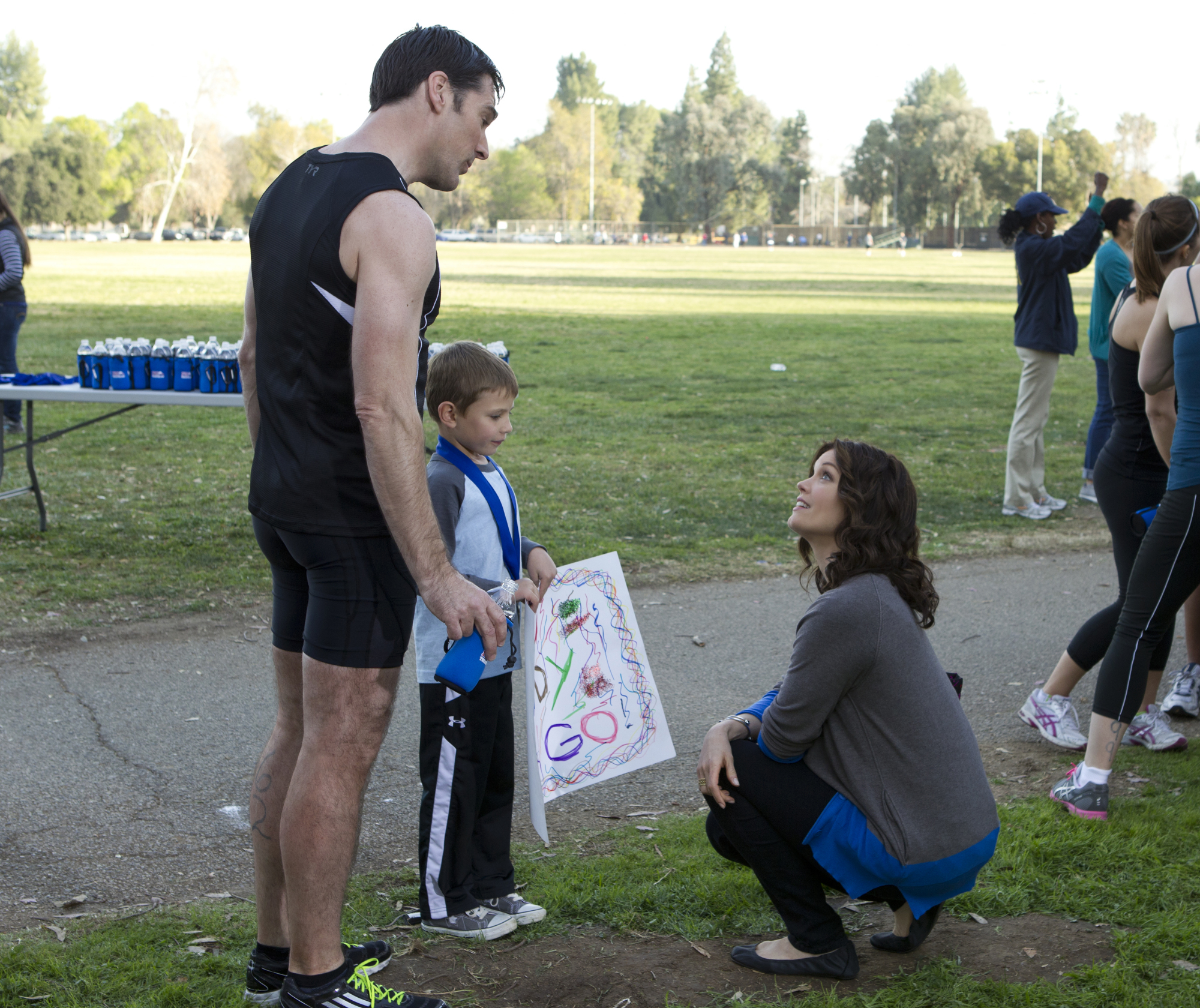 Still of Thomas Gibson, Bellamy Young and Cade Owens in Nusikalstami protai (2005)