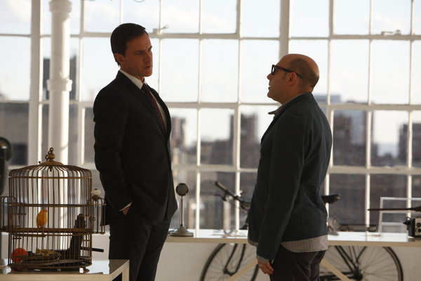 Still of Tim DeKay and Willie Garson in Aferistas (2009)