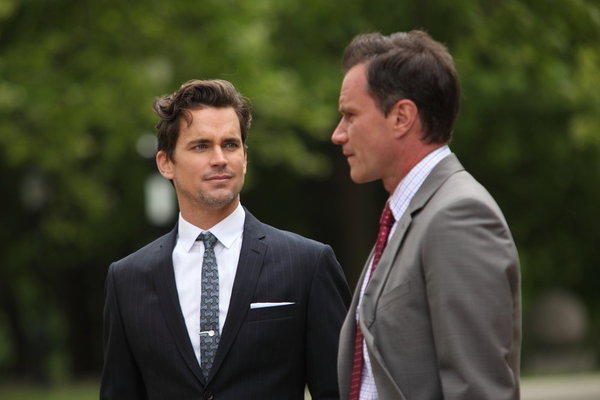 Still of Matt Bomer and Tim DeKay in Aferistas (2009)