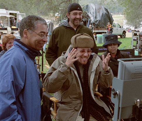 Cinematographer Remi Adefarasin (front left) and director Rob Minkoff (front center) with producer Don Hahn (rear center).