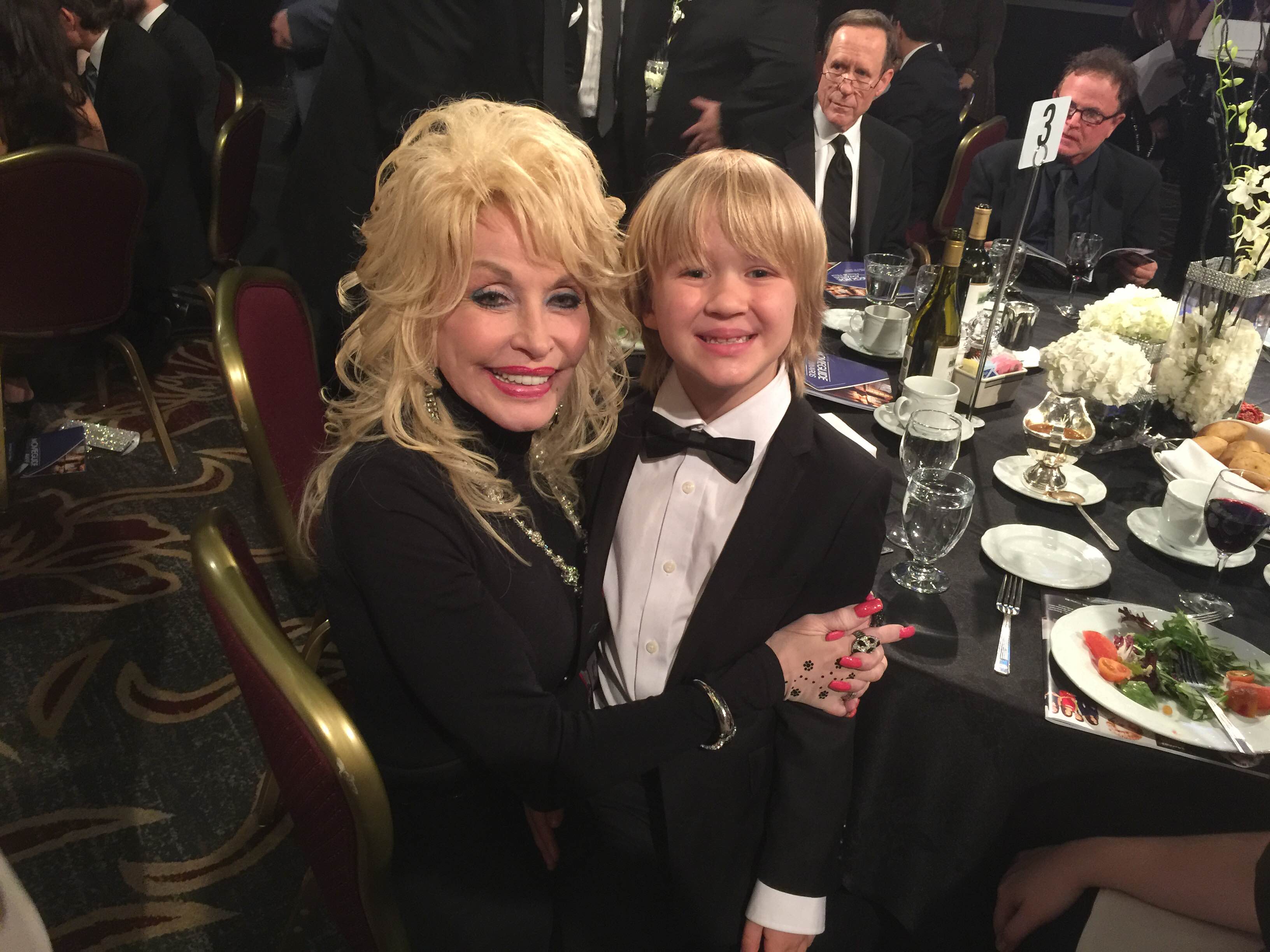 Bobby Batson with Dolly Parton at the 24th Annual MovieGuide Awards.