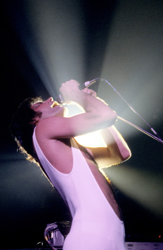 Queen's Freddie Mercury performing