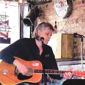 Picture of me performing a writers show at Roberts Western World on Lower Broadway in Nashville, TN