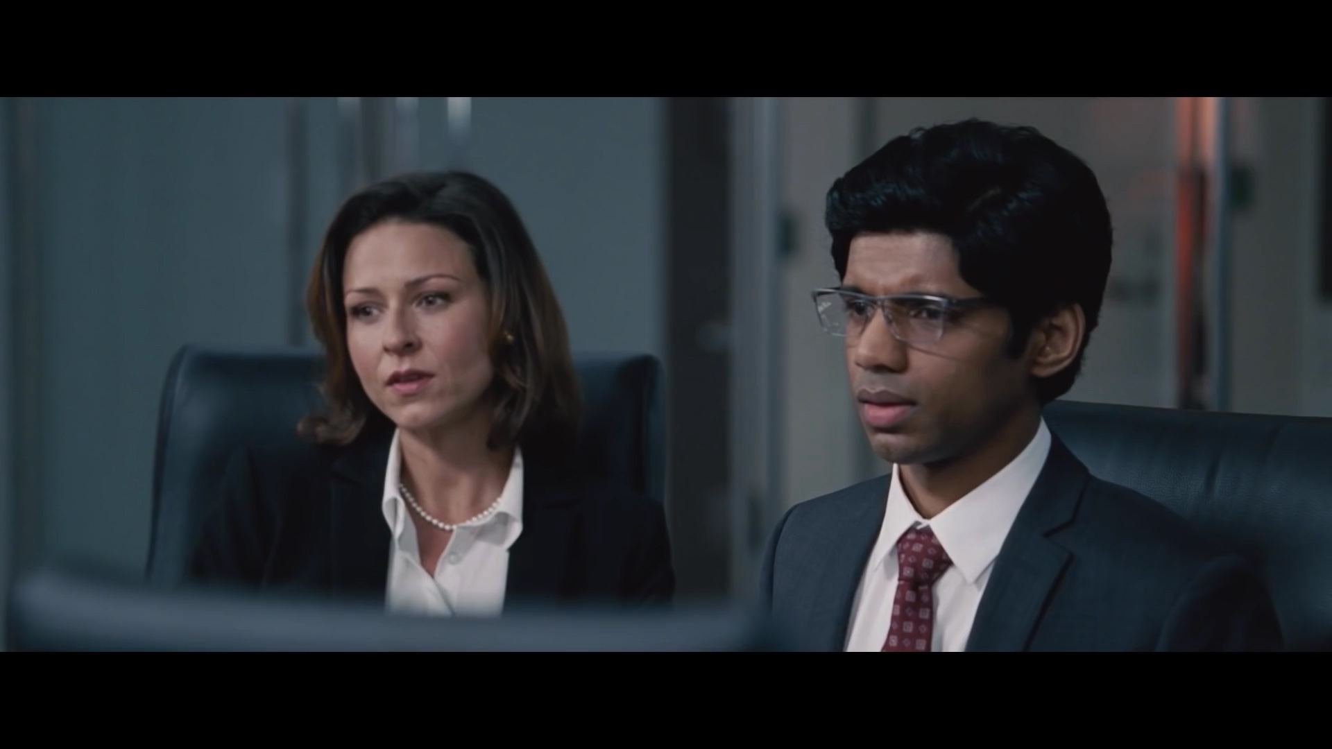 Still of Vanessa Cloke and Rajeev Jacob in The Big Short (2015)