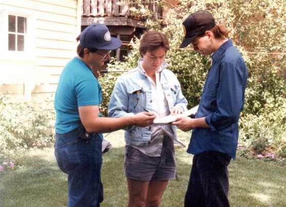 David Boles consulting with cinematographer and assistant director.