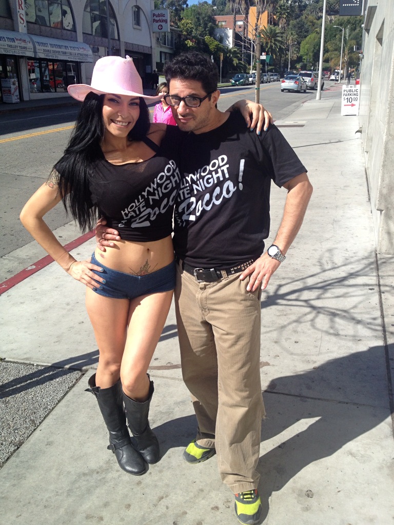 Rocco and Guest Host, WWE Diva, Shelly Martinez, prepare for some street interviews on Hollywood Boulevard.