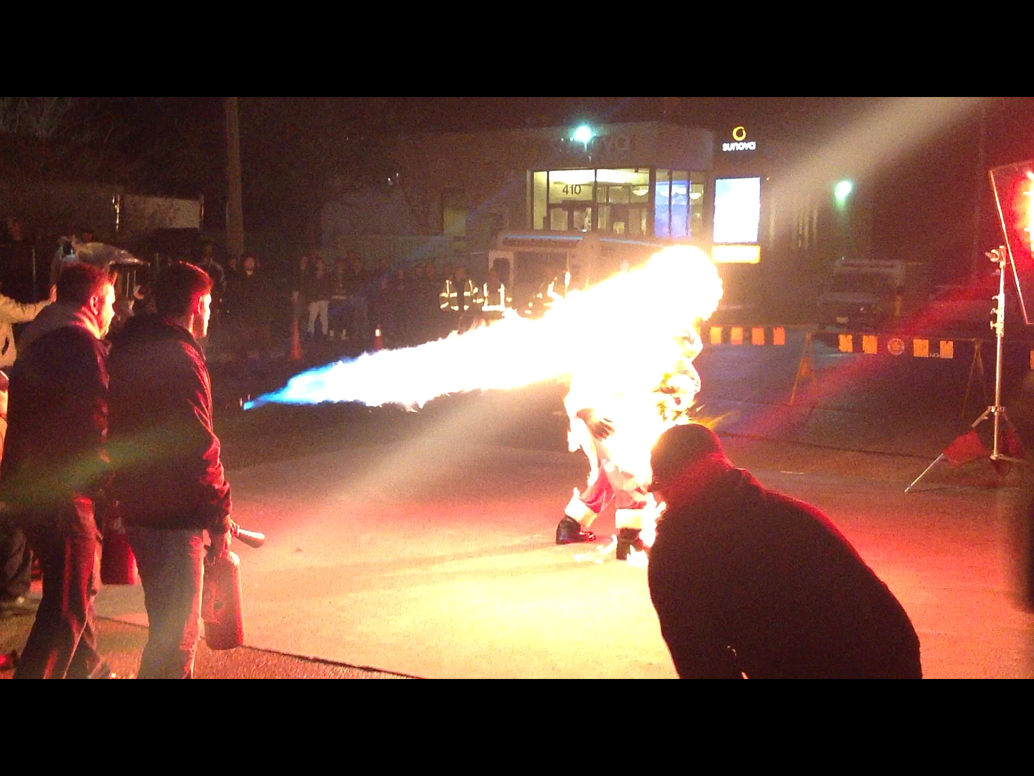 Daniel doing a body burn, with the help of a flamethrower. - On the set of Silent Night.