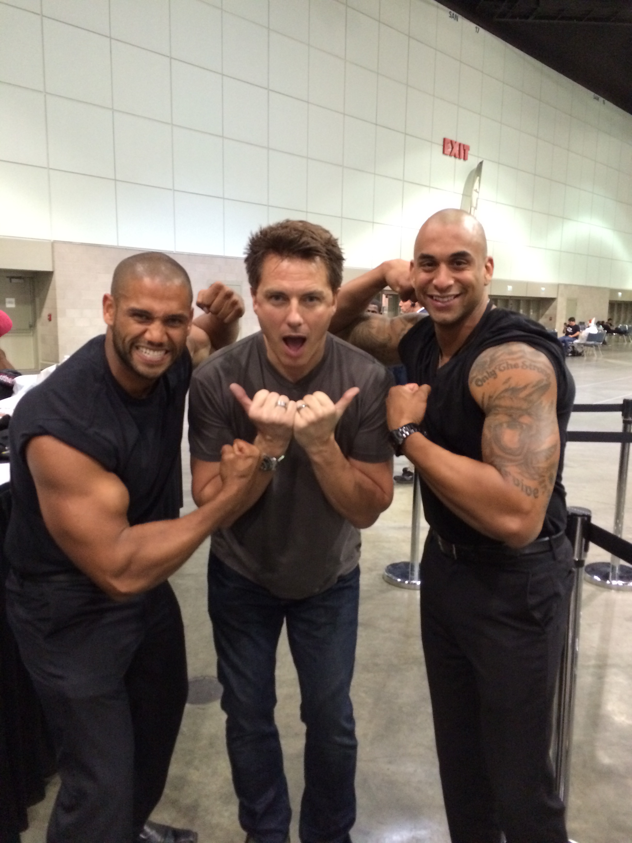 Jon Daza with actors John Barrowman and Michel Curiel at the 2014 Stan Lee Comikaze event.