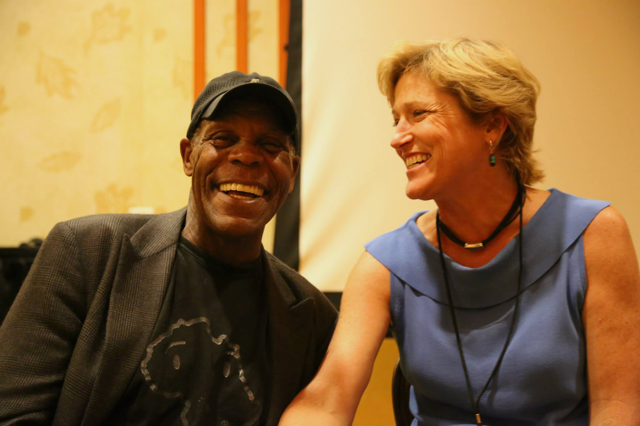 Katy Dore with Danny Glover sharing a laugh at the San Diego Native American Film Festival.