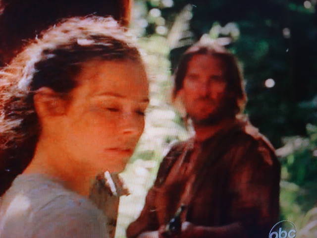 Joseph Wilson holds a gun on Evangeline Lilly in the ABC TV Show Lost Season V