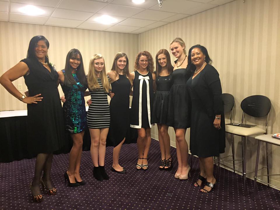 Backstage at the Dress for Success event in Louisville working as a model selling raffle tickets. (Kate is in the striped dress)