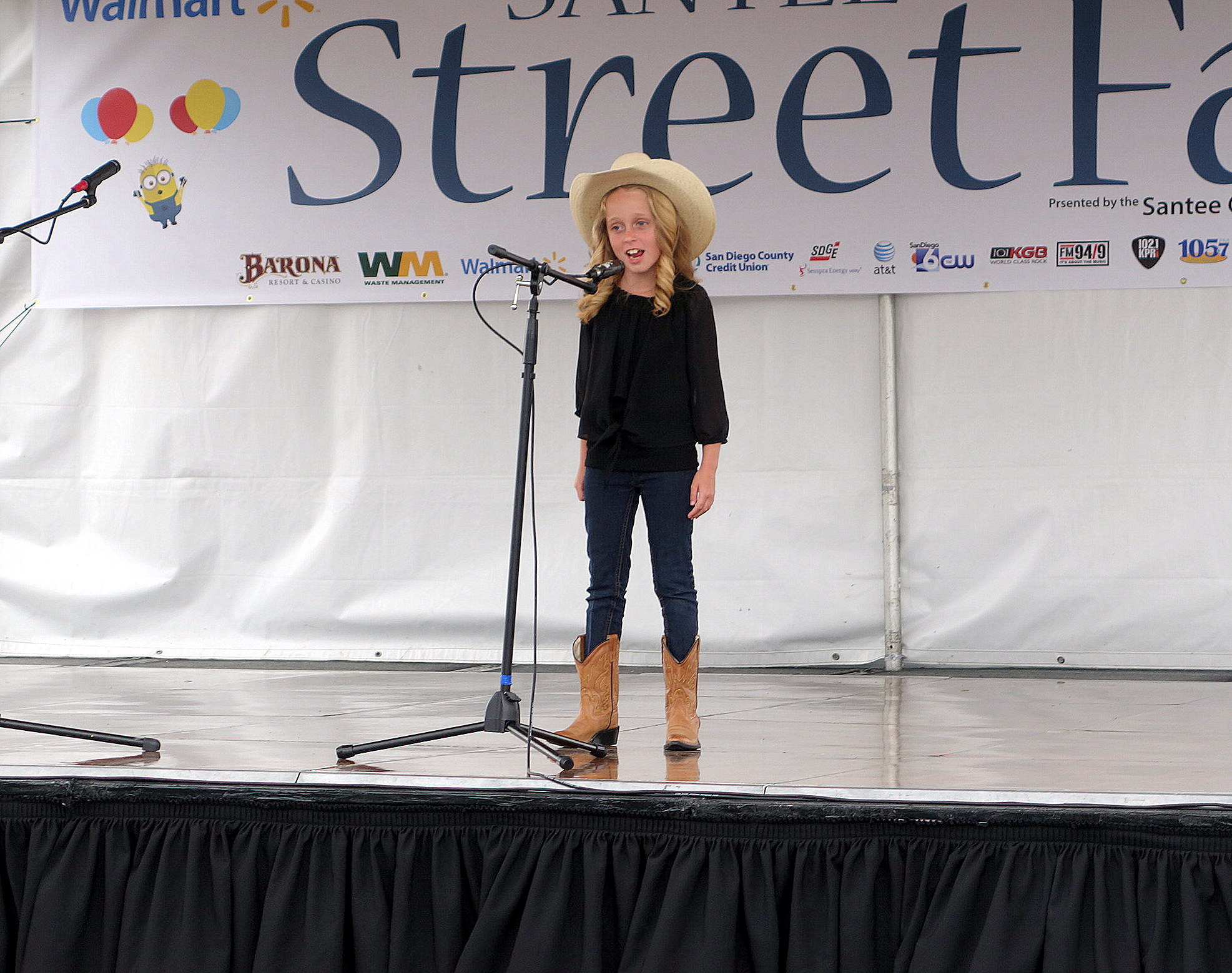 Singing solo at Santee Street Fair. 