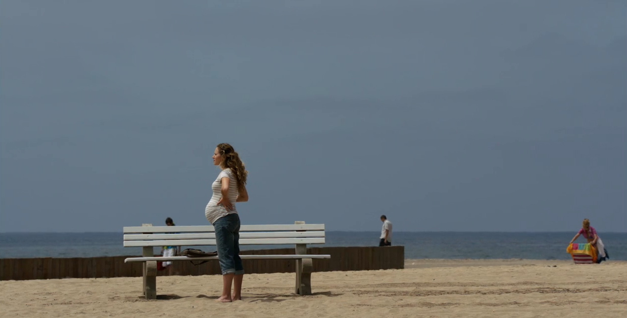 Jolie Franz as sunbather on Revenge. Filmed on location at Redondo Beach, CA.