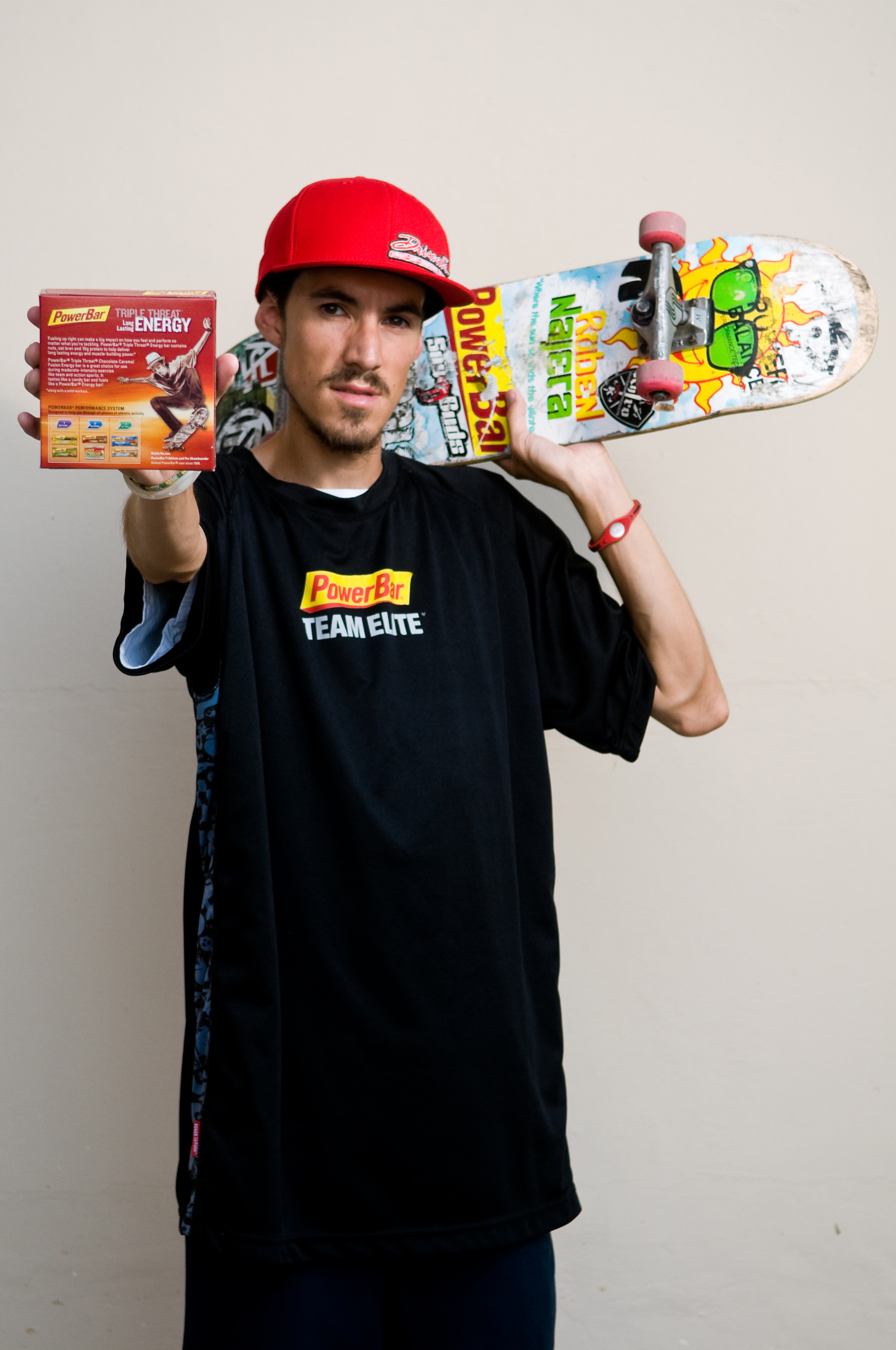 Photo of Ruben Najera holding up his Pro signature PowerBar Box cover which was sold in Target, Wal Mart, Ralphs, Vons, and Rite Aid stores worldwide.