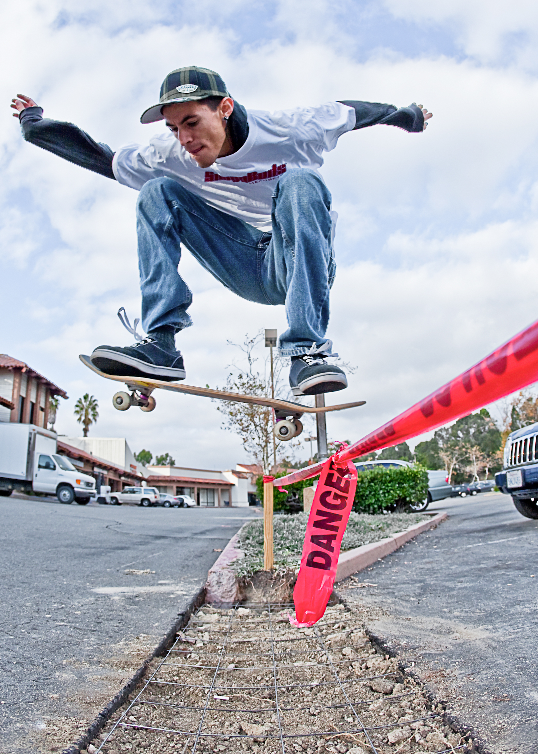 Action shot of Ruben Najera doing an ollie in San Diego,Ca.