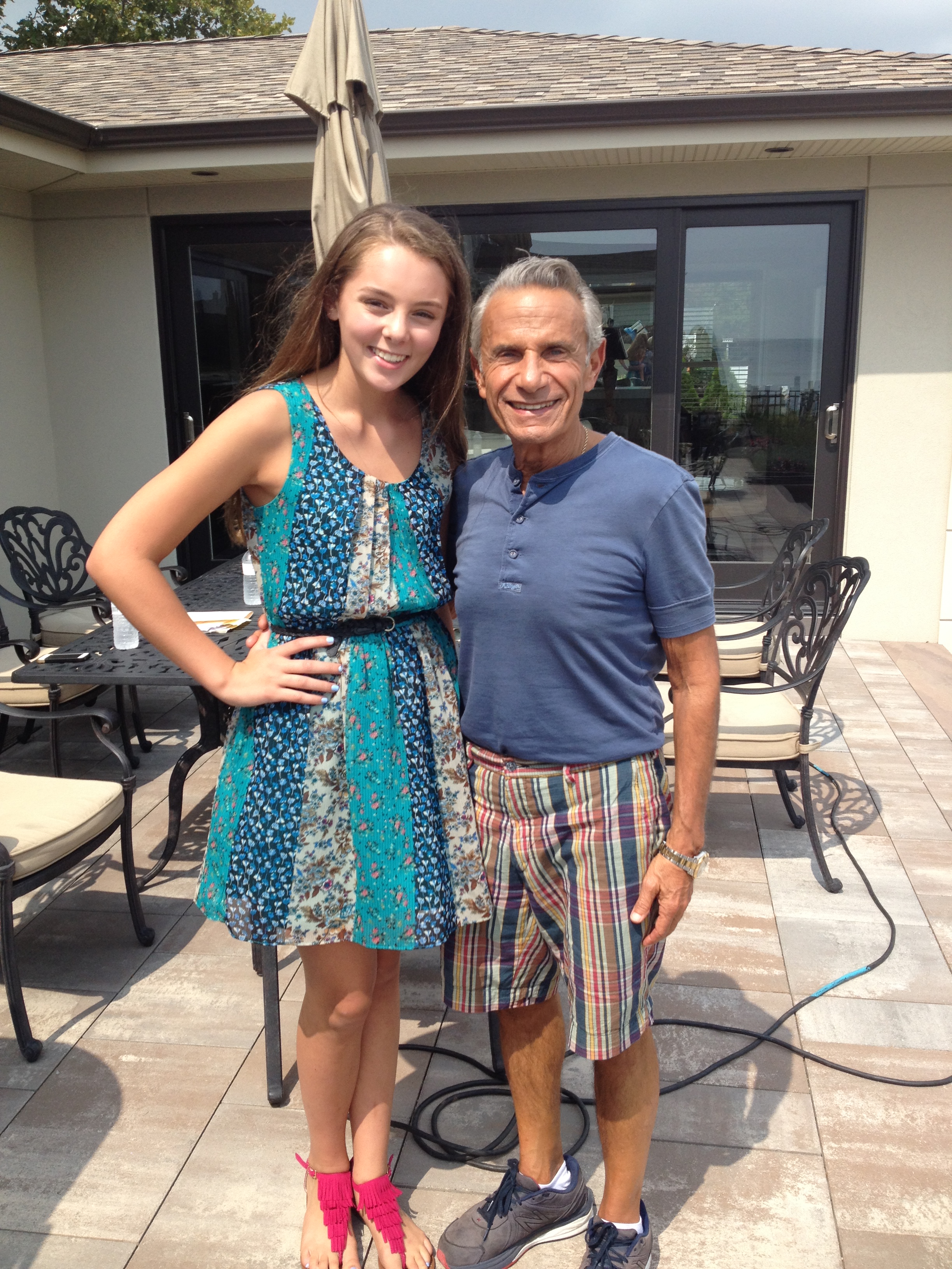 Lily with Charles Gameskarian, owner of Cambridge Paving Stones.