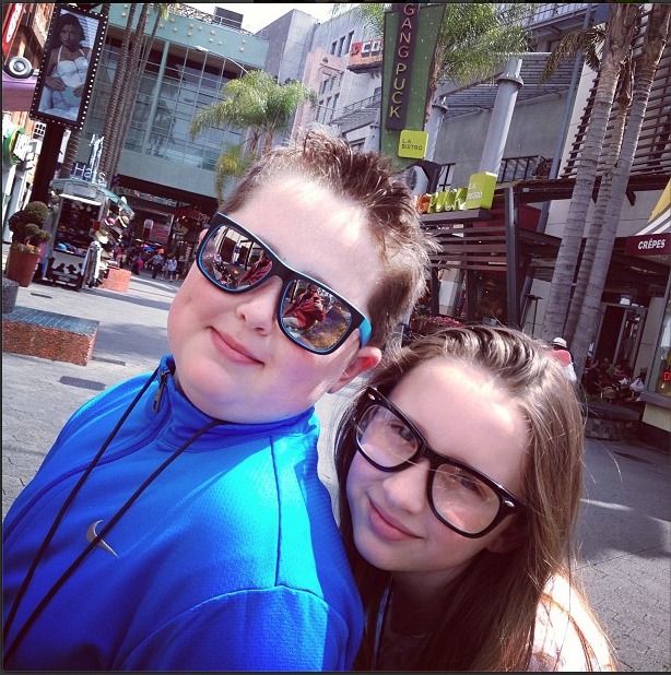 Aiden and his sister hanging out at Universal CityWalk.