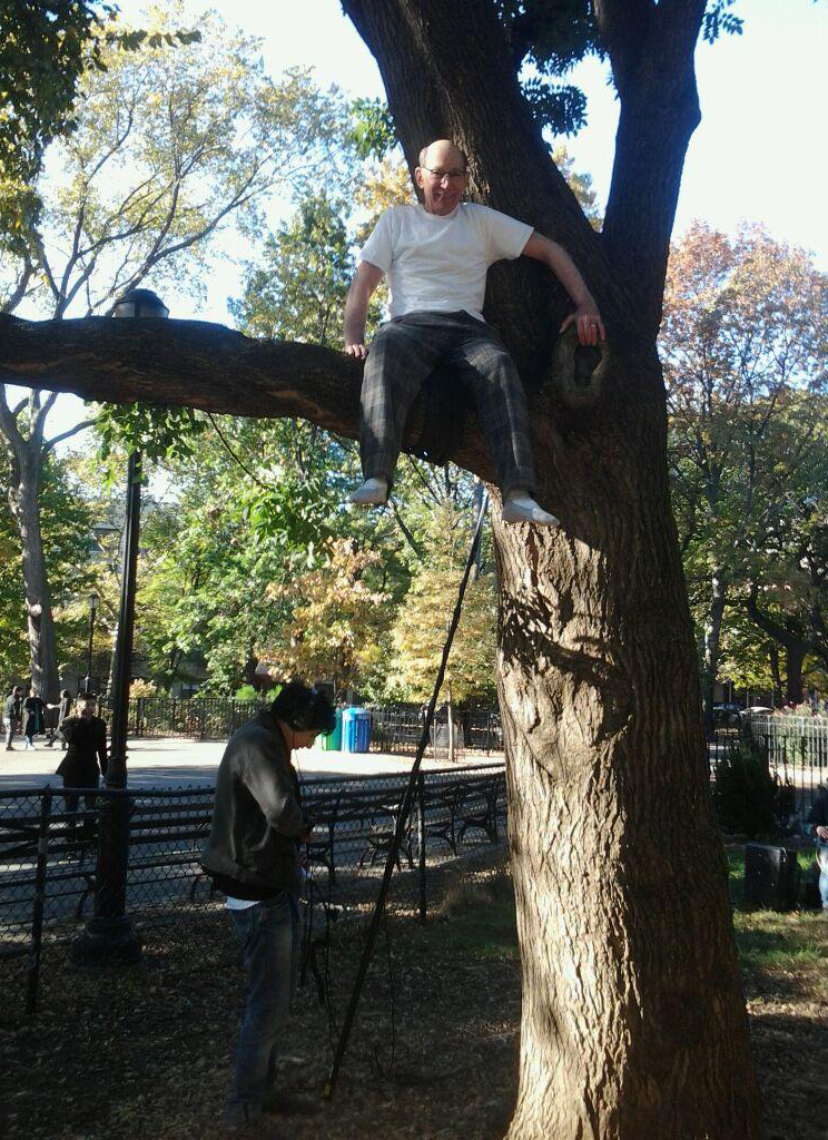 Frank (Harold Tarr), being rigged by stuntman, for jump out of a tree in 'Frank & Louisa'. (2013)