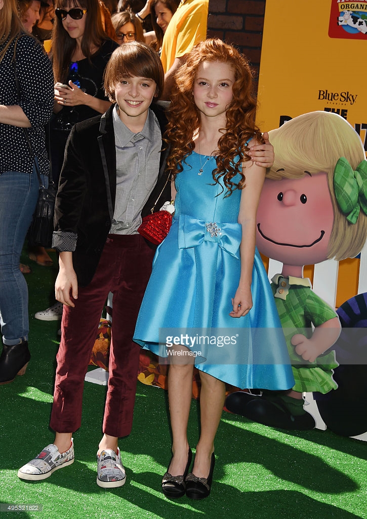 Actors Noah Schnapp (L) and Francesca Capaldi attend the premiere of 20th Century Fox's 'The Peanuts Movie' at the Regency Village Theatre in Westwood, California.